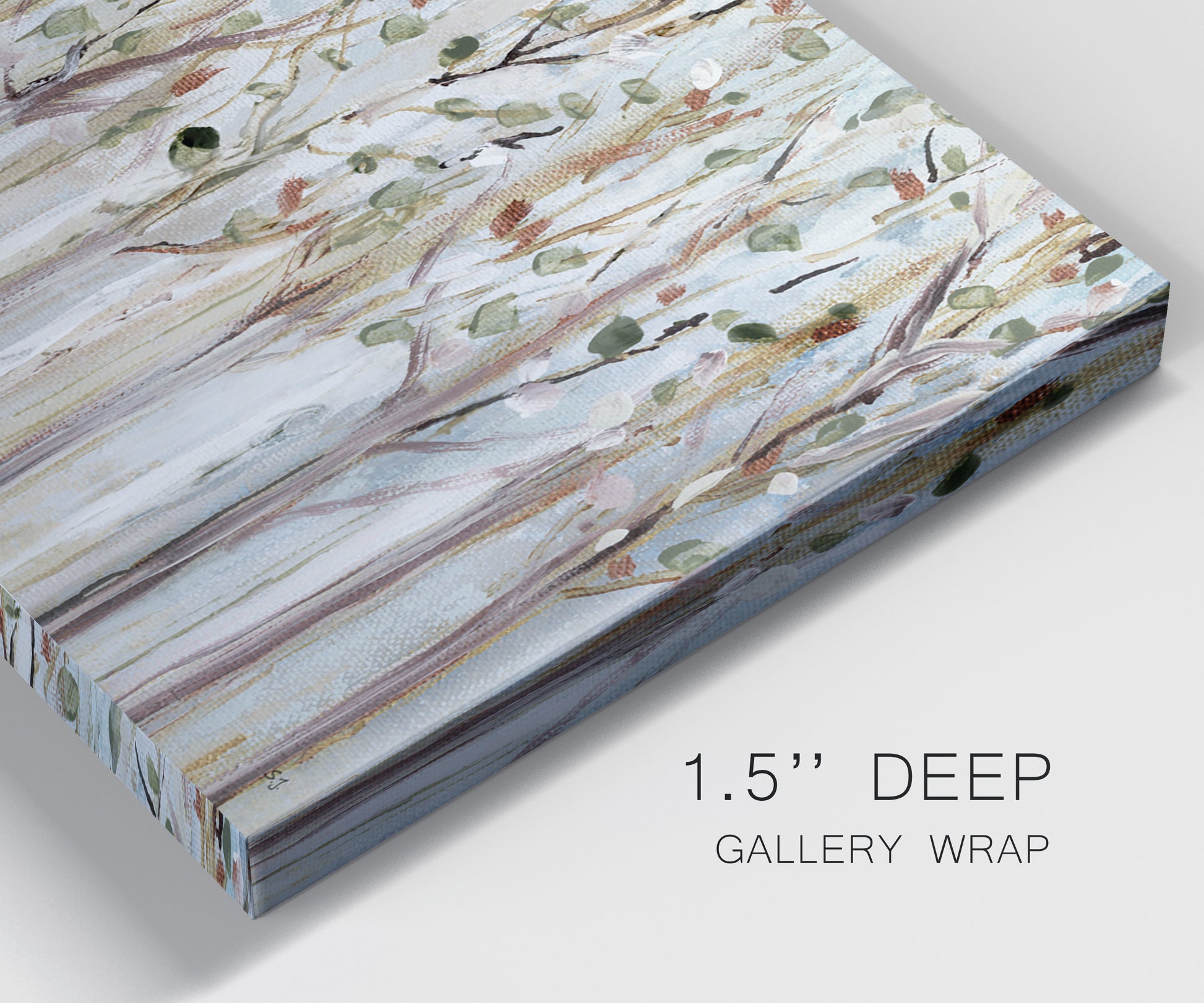 Close-up view of wrapped canvas corner featuring bare birch trees in winter forest.