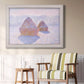 Impressionist winter haystack scene with sunlight by Claude Monet in an ornate weathered white frame displayed in a light-toned interior setting.