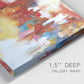 Close-up view of wrapped canvas corner featuring abstract city lights composition.
