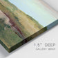 Close-up view of wrapped canvas corner featuring pastoral landscape with winding road.