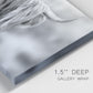 Close-up view of wrapped canvas corner featuring large highland cow portrait.