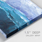 Close-up view of wrapped canvas corner featuring impressionist nautical harbor scene.