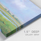 Close-up view of wrapped canvas corner featuring summer marshland with tall grasses.