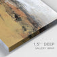 Close-up view of wrapped canvas corner featuring abstract bridge landscape in ochre.