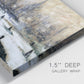 Close-up view of wrapped canvas corner featuring snowy village road in winter.
