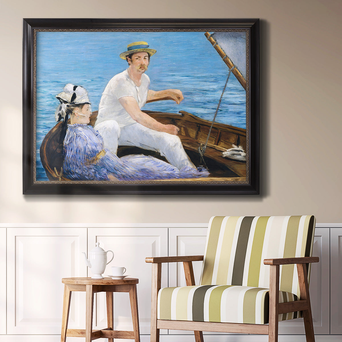 Impressionist leisure boating scene by Édouard Manet in an ornate black frame with gilded inner detail displayed in a light-toned interior setting.