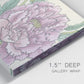 Close-up view of wrapped canvas corner featuring soft pink peony blossoms.