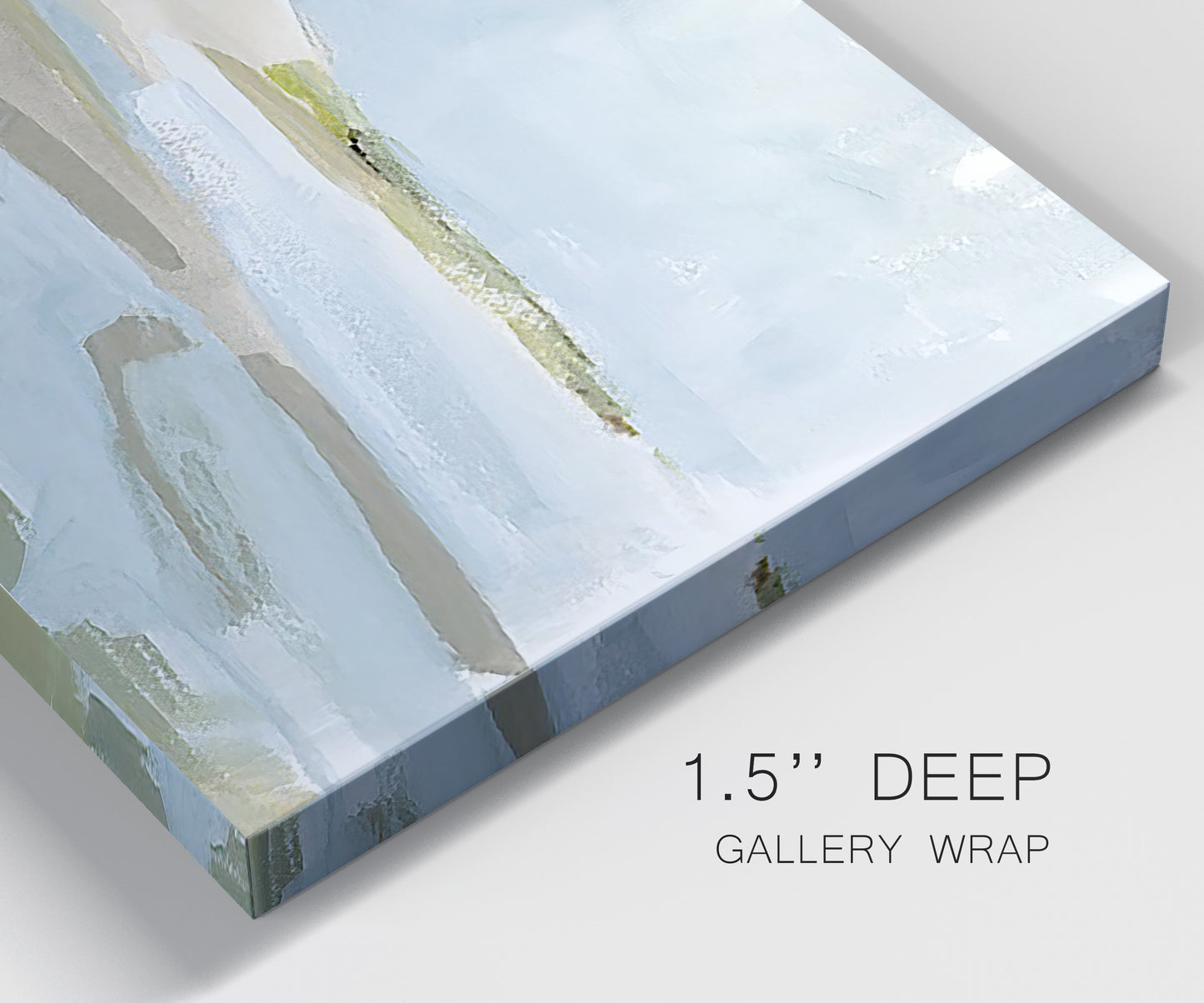 Close-up view of wrapped canvas corner featuring coastal cove with calm water.