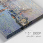Close-up view of wrapped canvas corner featuring evening harbor with reflections.