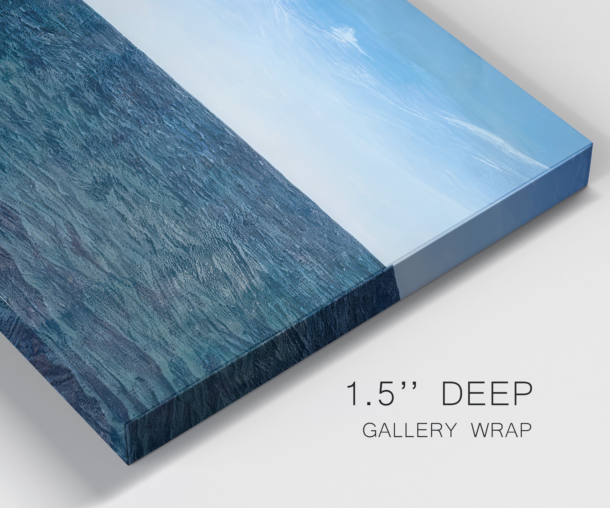 Close-up view of wrapped canvas corner featuring open water landscape with wide horizon.