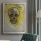 Expressive skull study painting by Vincent van Gogh in an {frame_style_descriptor} displayed in a neutral interior setting.