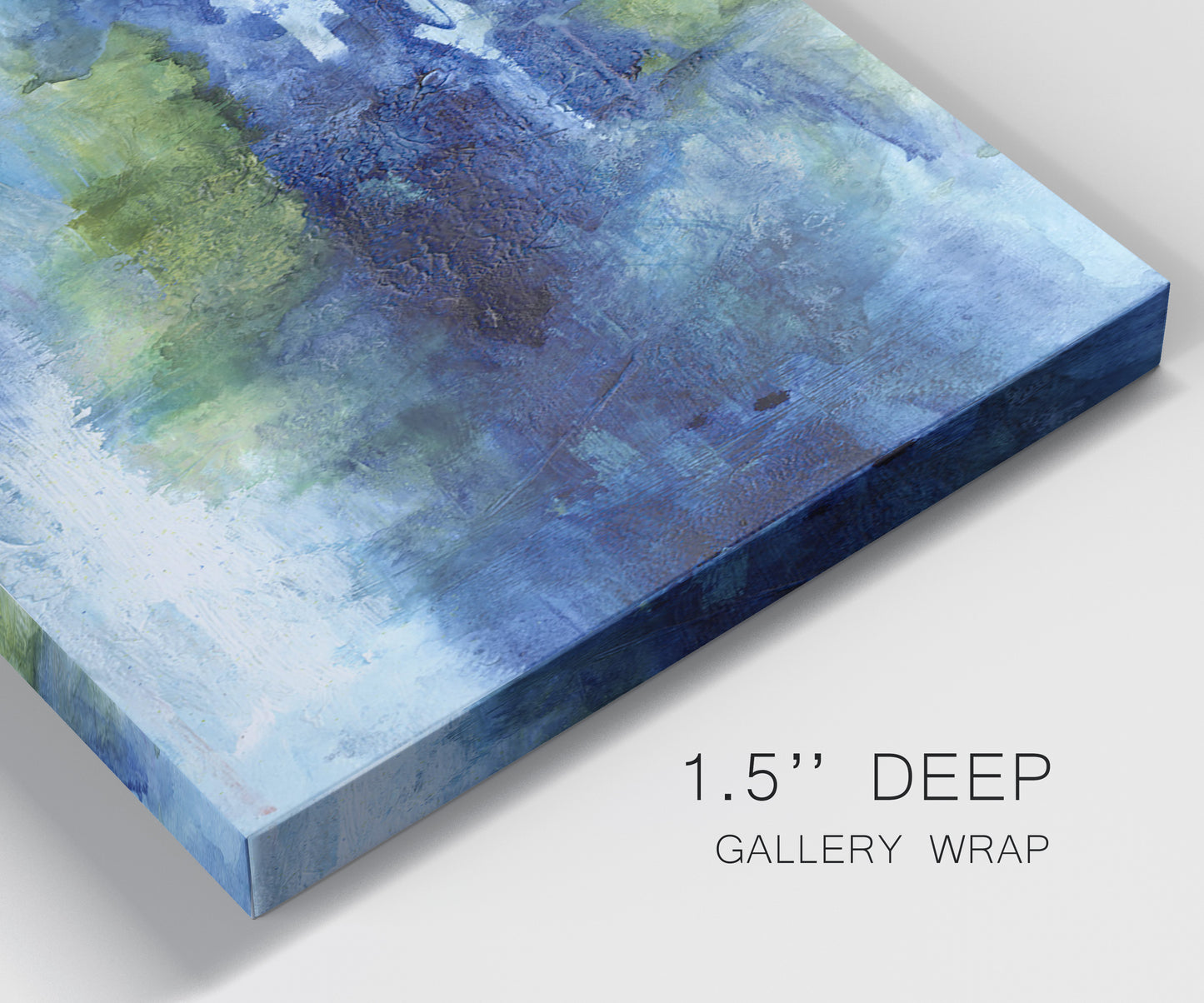Close-up view of wrapped canvas corner featuring flowing blue abstract watercolor.