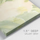 Close-up view of wrapped canvas corner featuring minimal verdant floral abstraction.