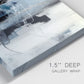 Close-up view of wrapped canvas corner featuring cool abstract winter color wash.
