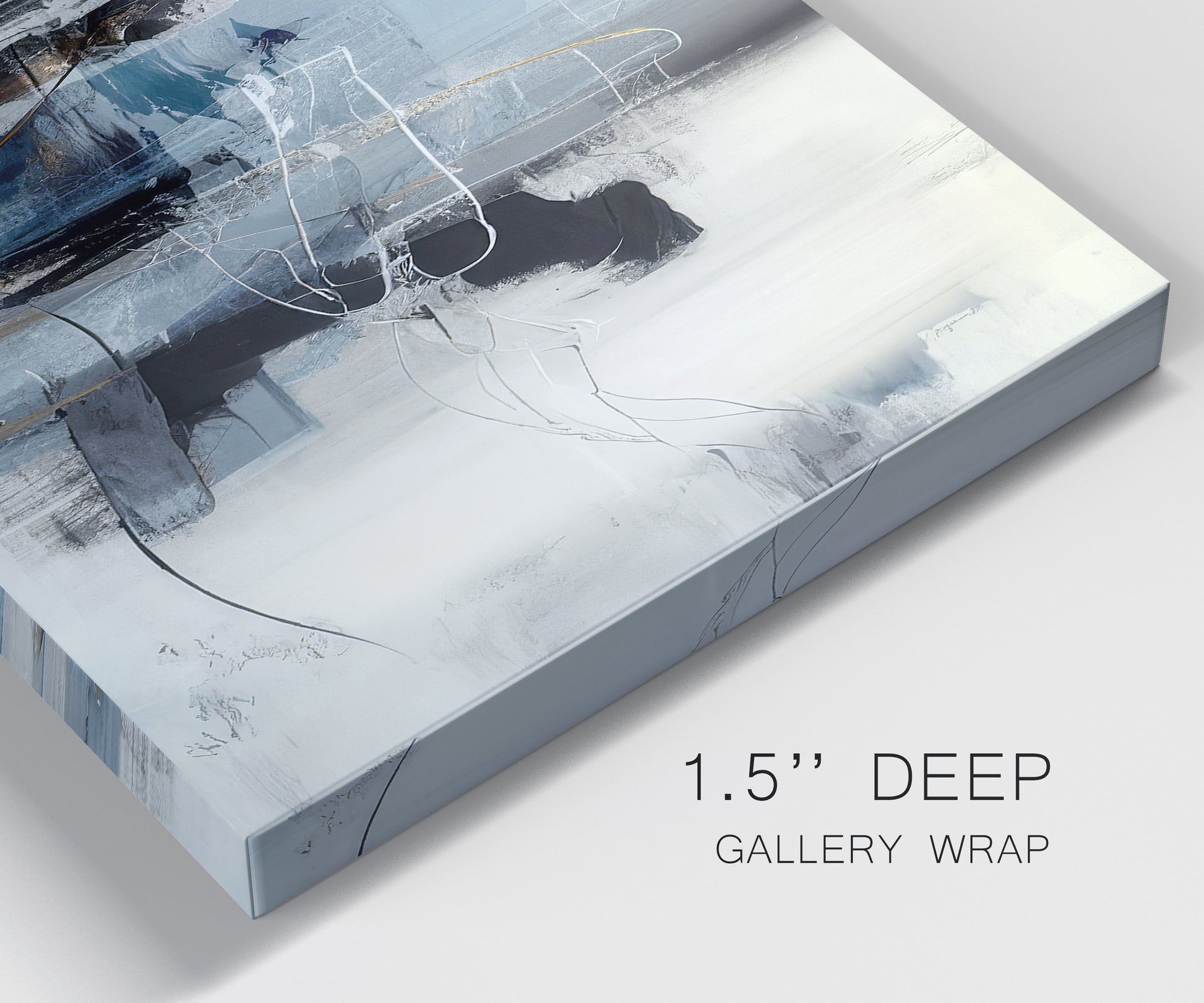 Close-up view of wrapped canvas corner featuring cool abstract winter color wash.
