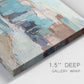 Close-up view of wrapped canvas corner featuring coastal shoreline with soft waves.
