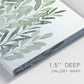 Close-up view of wrapped canvas corner featuring foraged leafy greens botanical study.