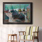 Impressionist coastal beach scene with boats by Claude Monet in an ornate black frame with gilded inner detail displayed in a light-toned interior setting.