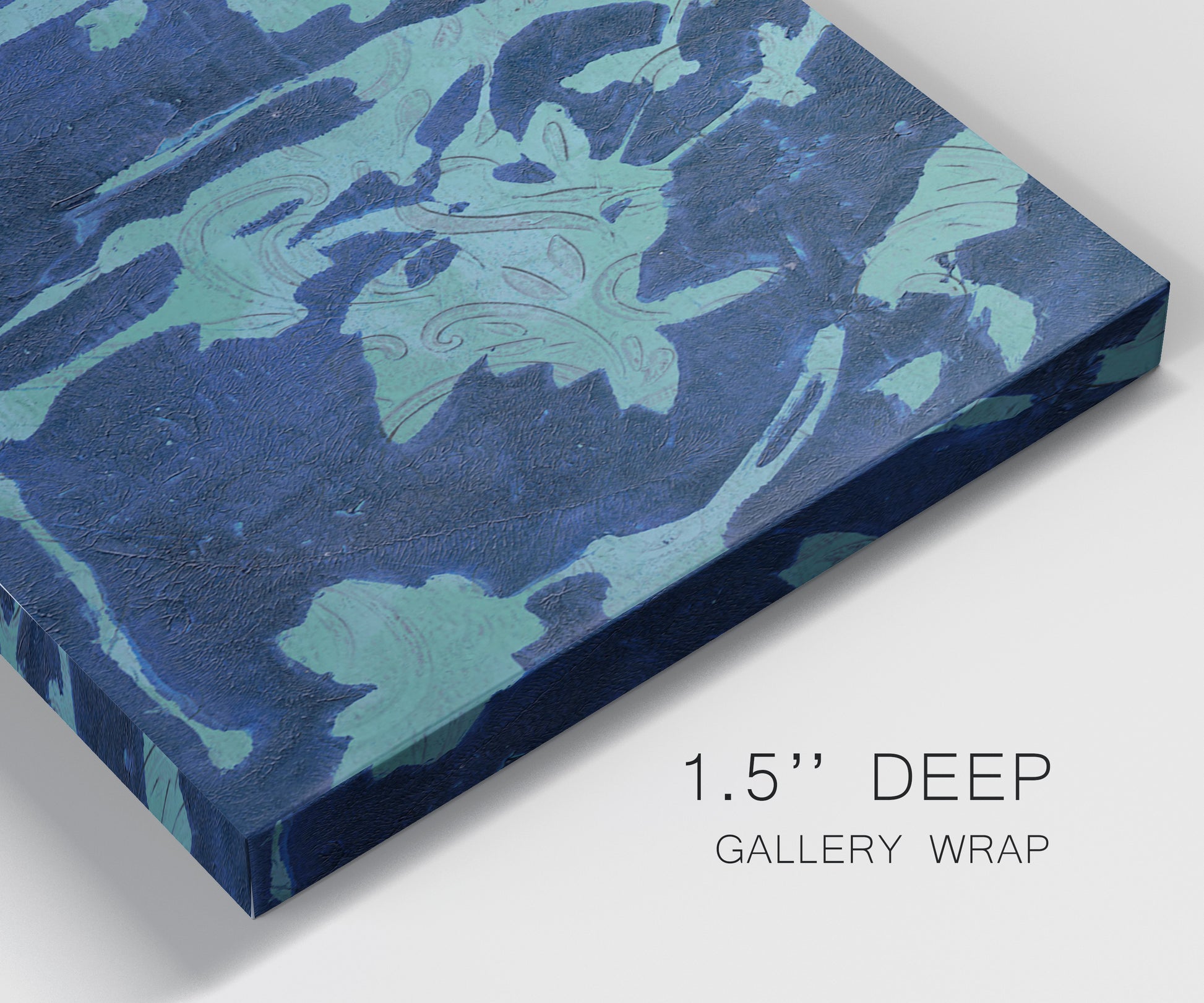 Close-up view of wrapped canvas corner featuring abstract floral shapes.