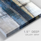 Close-up view of wrapped canvas corner featuring abstract blue urban composition.