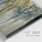 Close-up view of wrapped canvas corner featuring earth toned abstract leaf textures.