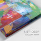 Close-up view of wrapped canvas corner featuring vibrant abstract color field panels.