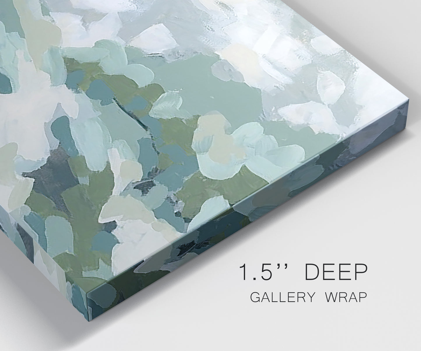 Close-up view of wrapped canvas corner featuring lush green hillside rolling landscape.