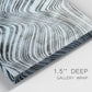 Close-up view of wrapped canvas corner featuring coastal shoreline with gentle surf.