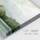 Close-up view of wrapped canvas corner featuring riverbank watercolor landscape.