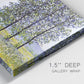 Close-up view of wrapped canvas corner featuring sunlight filtering through tall poplars.
