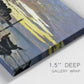 Close-up view of wrapped canvas corner featuring river at dusk with fading light.