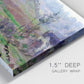Close-up view of wrapped canvas corner featuring cliffside cottage overlooking sea.