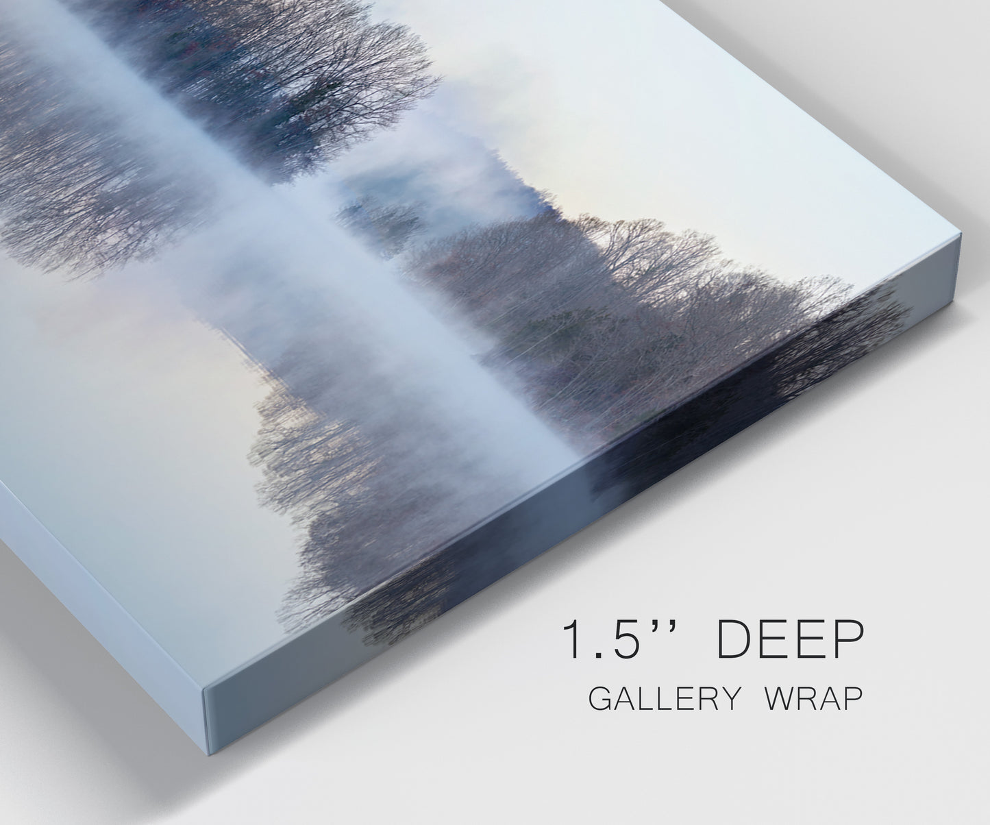 Close-up view of wrapped canvas corner featuring misty water landscape photograph.