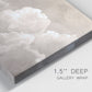 Close-up view of wrapped canvas corner featuring soft whimsical cloudscape.
