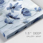 Close-up view of wrapped canvas corner featuring indigo floral blossoms awakening.