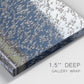 Close-up view of wrapped canvas corner featuring group of animals in open field.