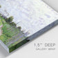 Close-up view of wrapped canvas corner featuring spring landscape with blossoming trees.
