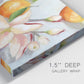 Close-up view of wrapped canvas corner featuring bright tangerine still life blossoms.