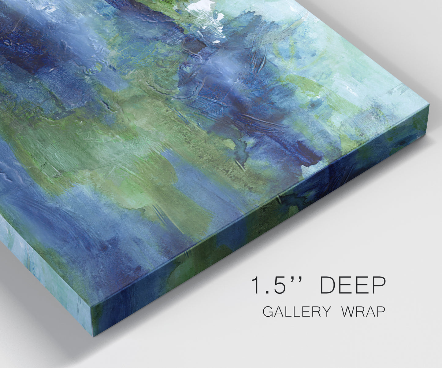 Close-up view of wrapped canvas corner featuring flowing blue abstract watercolor.