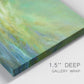 Close-up view of wrapped canvas corner featuring coastal shoreline under open sky.
