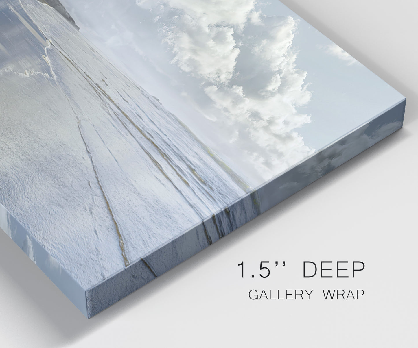 Close-up view of wrapped canvas corner featuring endless beach meeting ocean horizon.