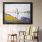 Impressionist coastal harbor at dusk by Paul Signac in an ornate black frame with gilded inner detail displayed in a light-toned interior setting.