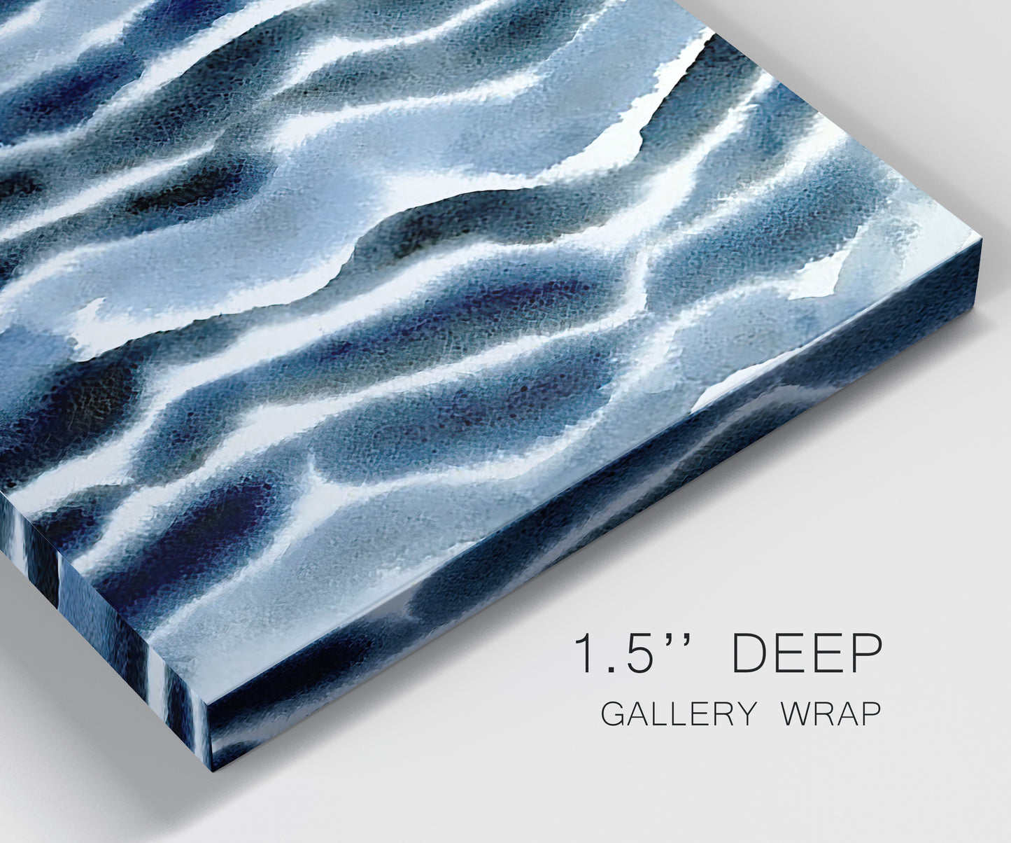 Close-up view of wrapped canvas corner featuring flowing blue watercolor wave forms.