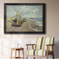 Impressionist coastal fishing boats scene by Vincent van Gogh in an ornate black frame with gilded inner detail displayed in a light-toned interior setting.