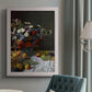 Impressionist floral still life painting by Claude Monet in an {frame_style_descriptor} displayed in a neutral interior setting.