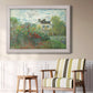 Impressionist garden landscape at Argenteuil by Claude Monet in an ornate weathered white frame displayed in a light-toned interior setting.