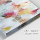 Close-up view of wrapped canvas corner featuring abstract directional visual shift.