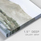 Close-up view of wrapped canvas corner featuring desert mountain landscape watercolor.