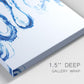 Close-up view of wrapped canvas corner featuring indigo abstract vapor watercolor.