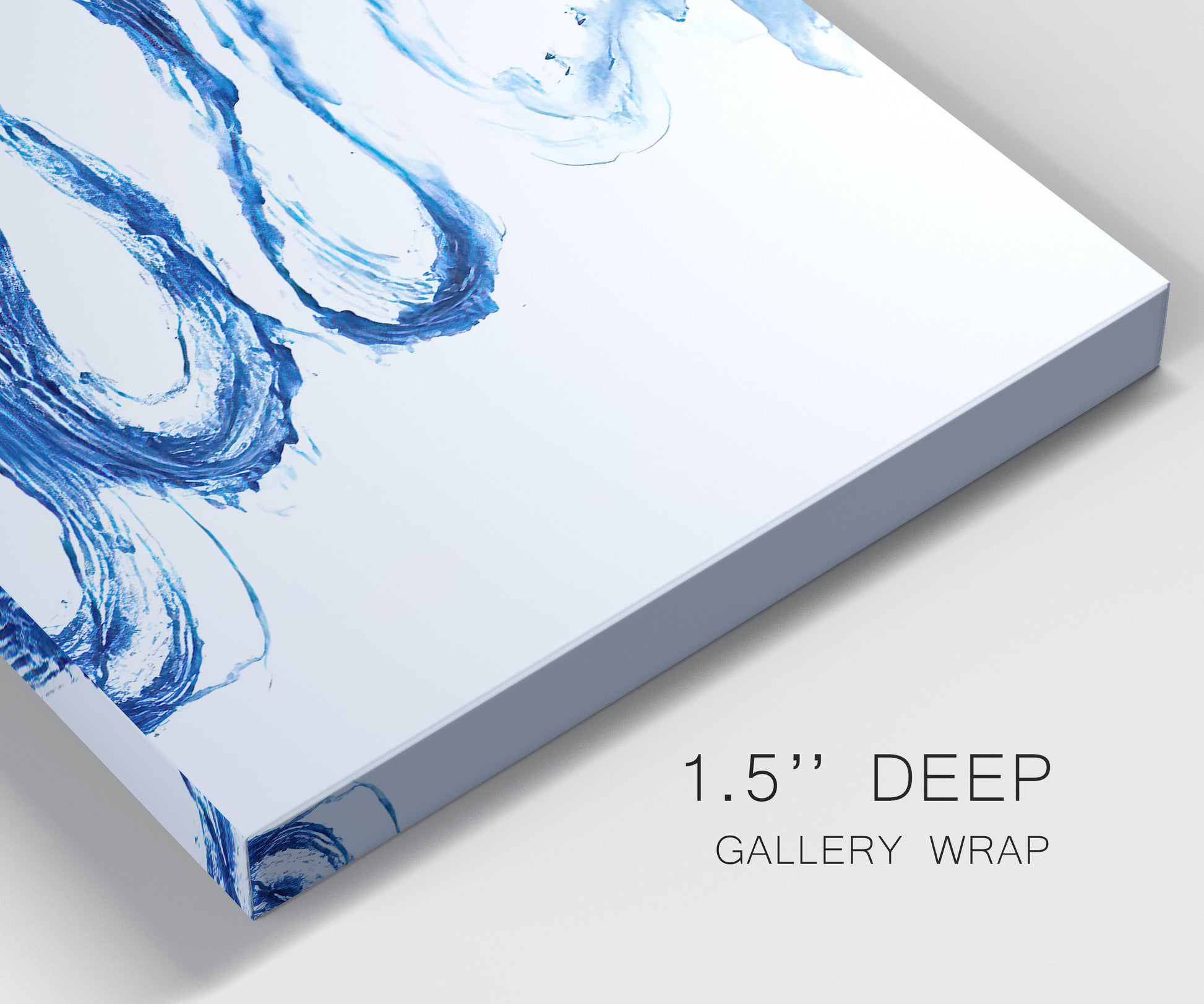 Close-up view of wrapped canvas corner featuring indigo abstract vapor watercolor.